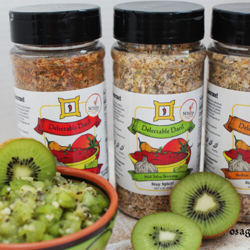 kiwi salsa with bottles of Delectable Datil Salsa Seasoning